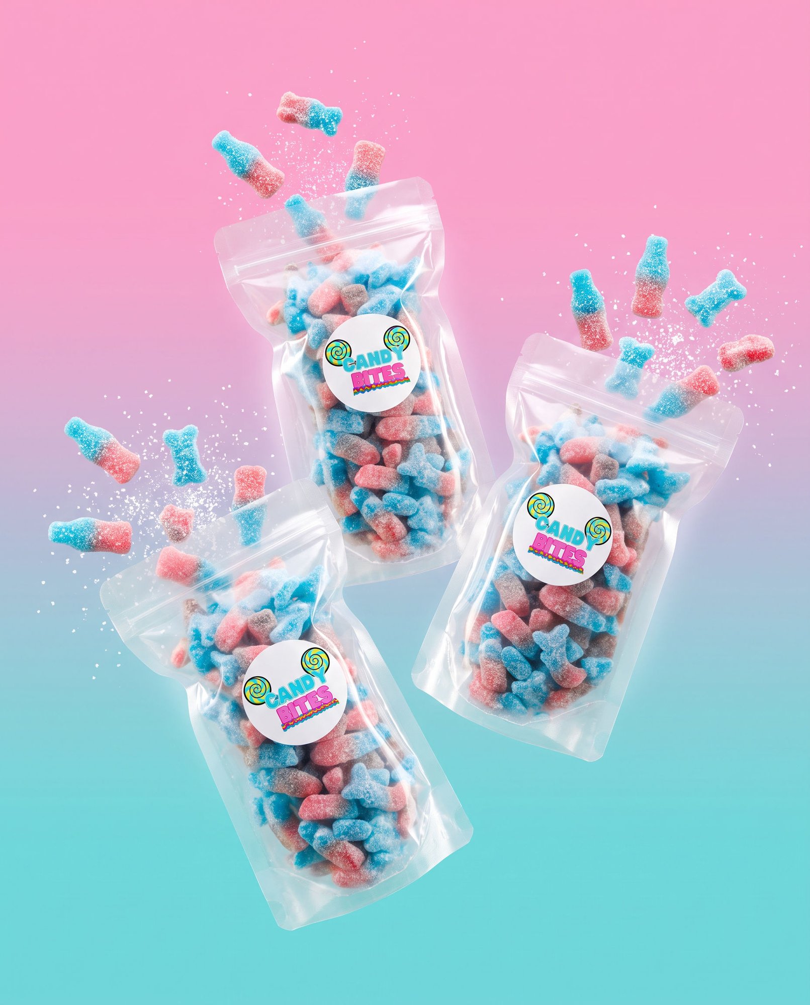 AI concept: three Candy Bites pouches floating with sour candies on a pink-to-aqua gradient